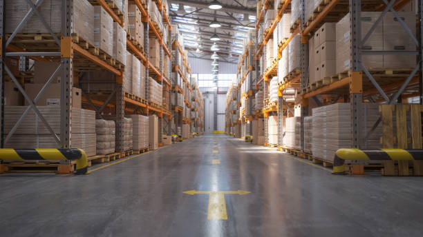 Warehouse space optimization with high stacked pallets and organized aisles.