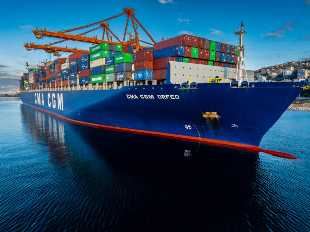 An image of a cargo ship loaded with containerized freights. 