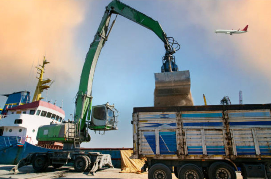 Crane unloading bulk cargo at port showing break bulk vs cross docking process.